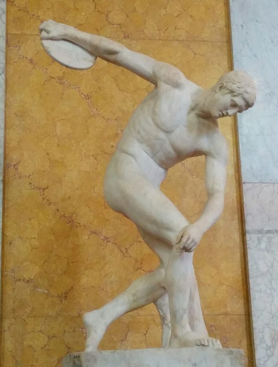 Marble statue of the Discobolus (discus thrower), a classical study in focus and precision